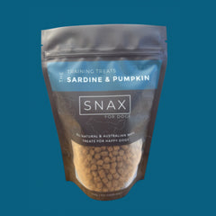 Snax for dogs training treats package with sardine and pumpkin flavor on a blue background