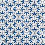 Navy blue and cream geometric tile print fabric for Tinka & Co handmade water-resistant dog snood. Copy
