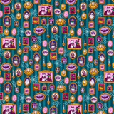 A repeating Halloween-themed pattern on a teal background with purple cats in witch hats, pink ghosts, bats, candles, spiderwebs, and gold-framed ornaments.