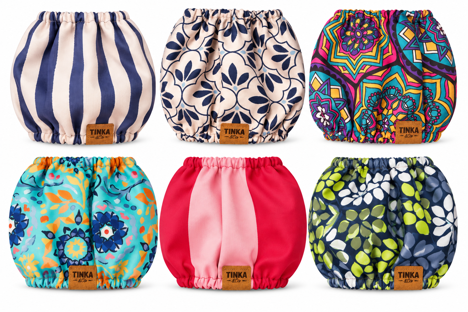 Six dogs snoods arranged in a 2x3 grid on a white background. Each diaper has a different print: navy and cream stripes, navy floral, multicolor mandala, turquoise floral, solid pink, and navy green-and-white floral.